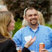 Ben Rapin, and guests talking.